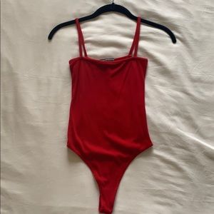 Red body suit